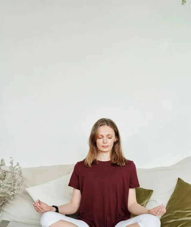 Person meditating — holistic mental wellbeing support