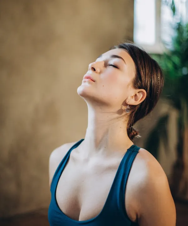 Person relaxing at home after a telehealth consultation